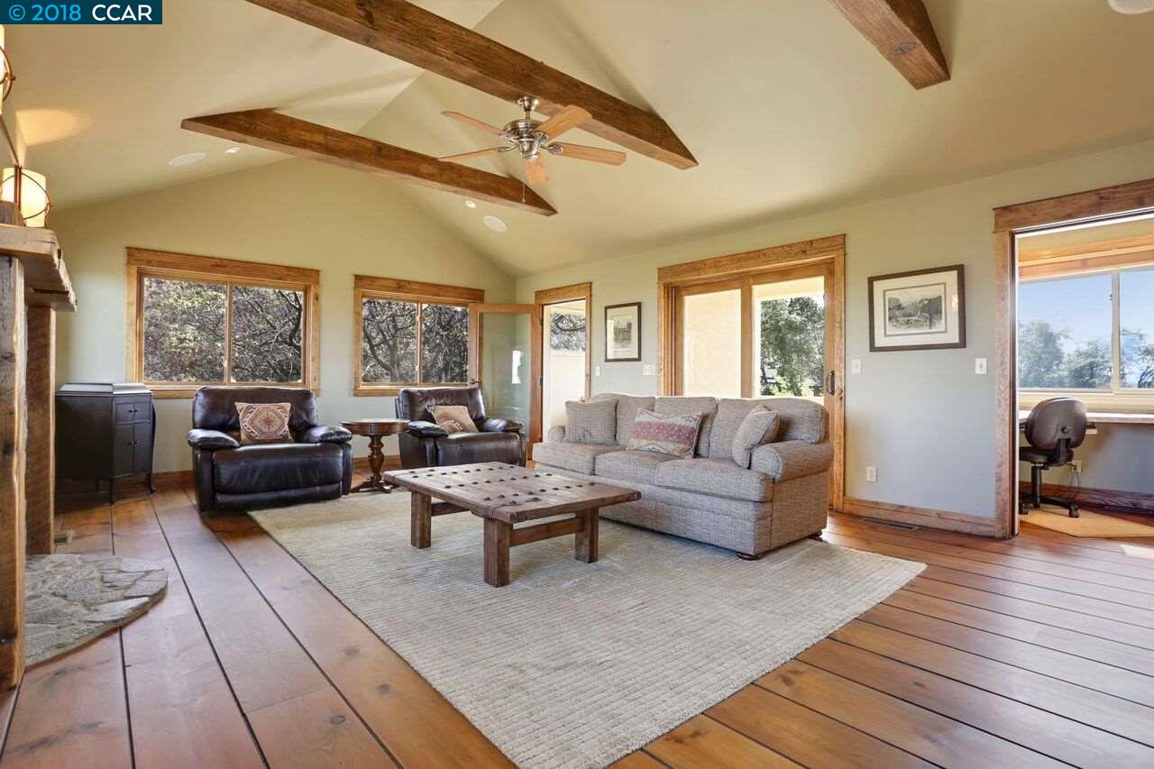 300 Eagle Drive Murphys, CA 95247 - Photo 32 of 40 a living room with furniture and a wooden floor