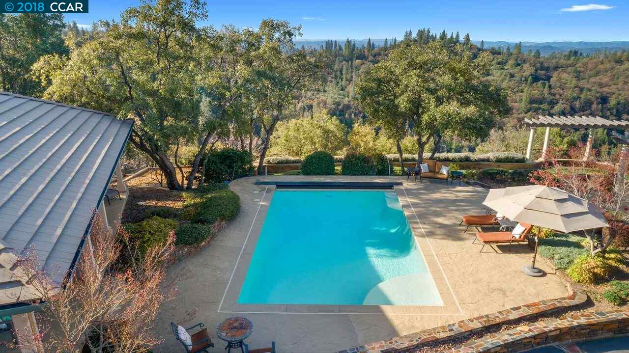 300 Eagle Drive Murphys, CA 95247 - Photo 40 of 40 a view of yard with swimming pool and trees