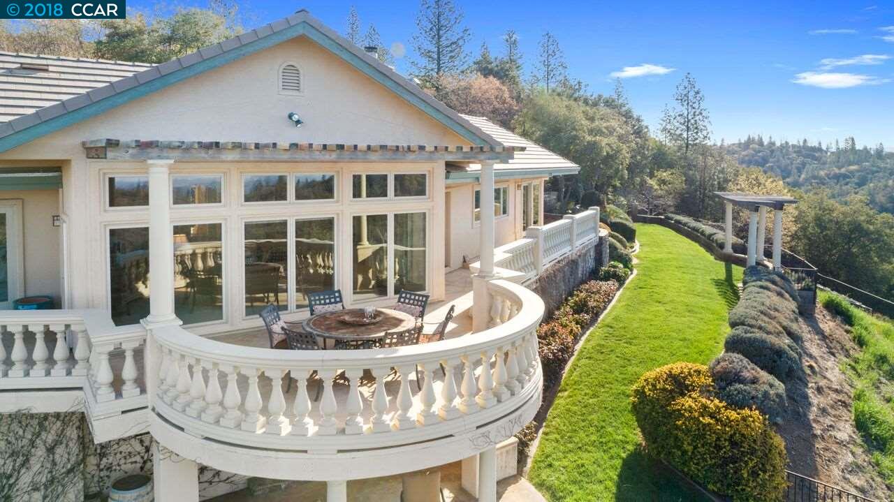 300 Eagle Drive Murphys, CA 95247 - Photo 7 of 40 a view of a house with a wooden fence