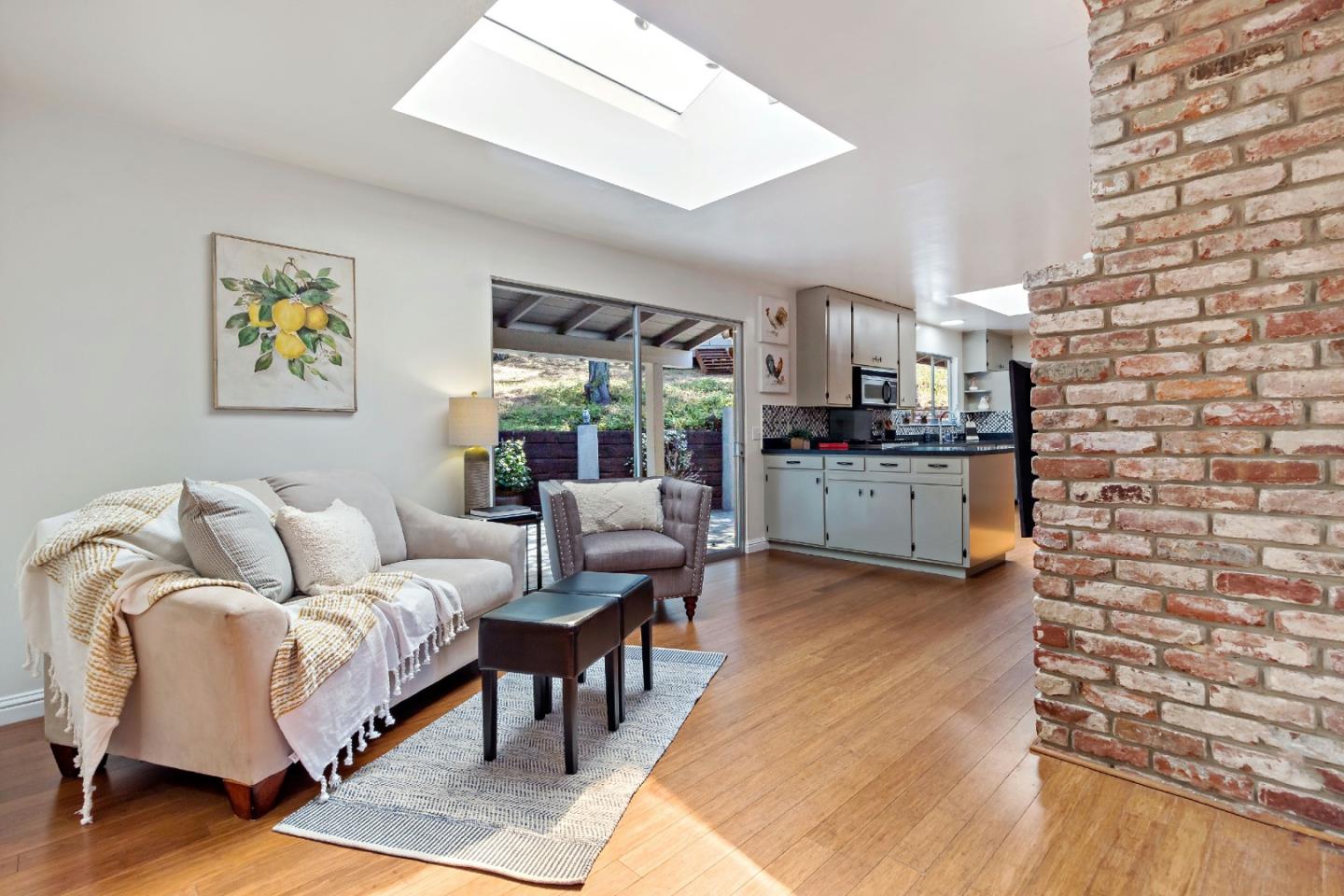 335 Harcross Road Woodside, CA 94062 - Photo 12 of 72 a living room with furniture and a kitchen