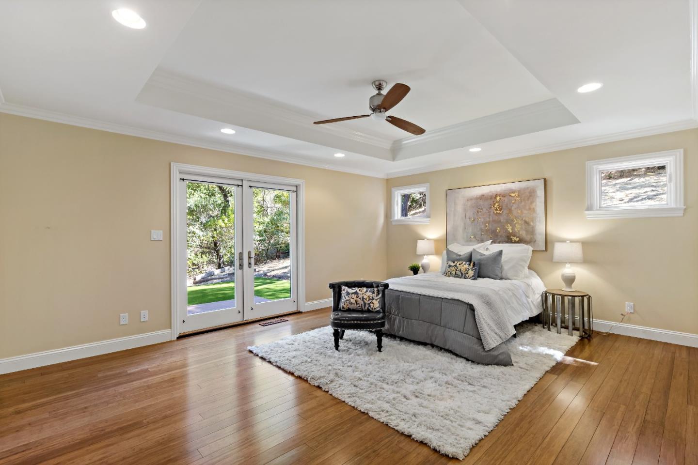 335 Harcross Road Woodside, CA 94062 - Photo 24 of 72 a living room with a bed furniture and a window