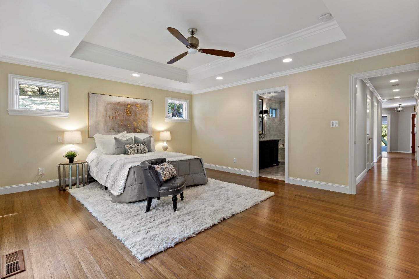 335 Harcross Road Woodside, CA 94062 - Photo 26 of 72 a bedroom with a bed and wooden floor