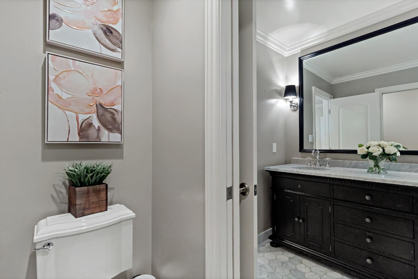 335 Harcross Road Woodside, CA 94062 - Photo 29 of 72 a bathroom with a toilet a sink and a mirror