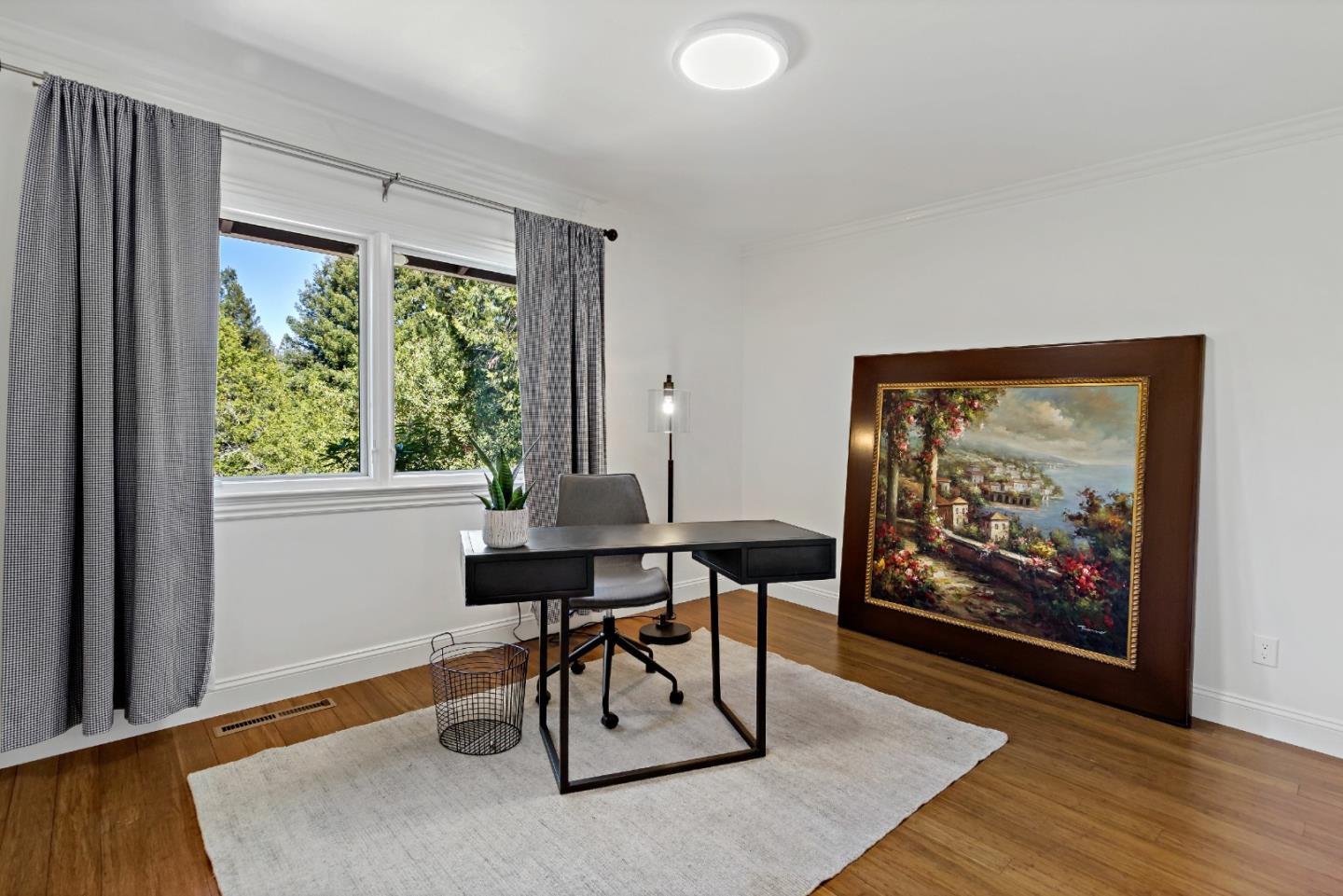 335 Harcross Road Woodside, CA 94062 - Photo 32 of 72 a workspace with furniture window and wooden floor