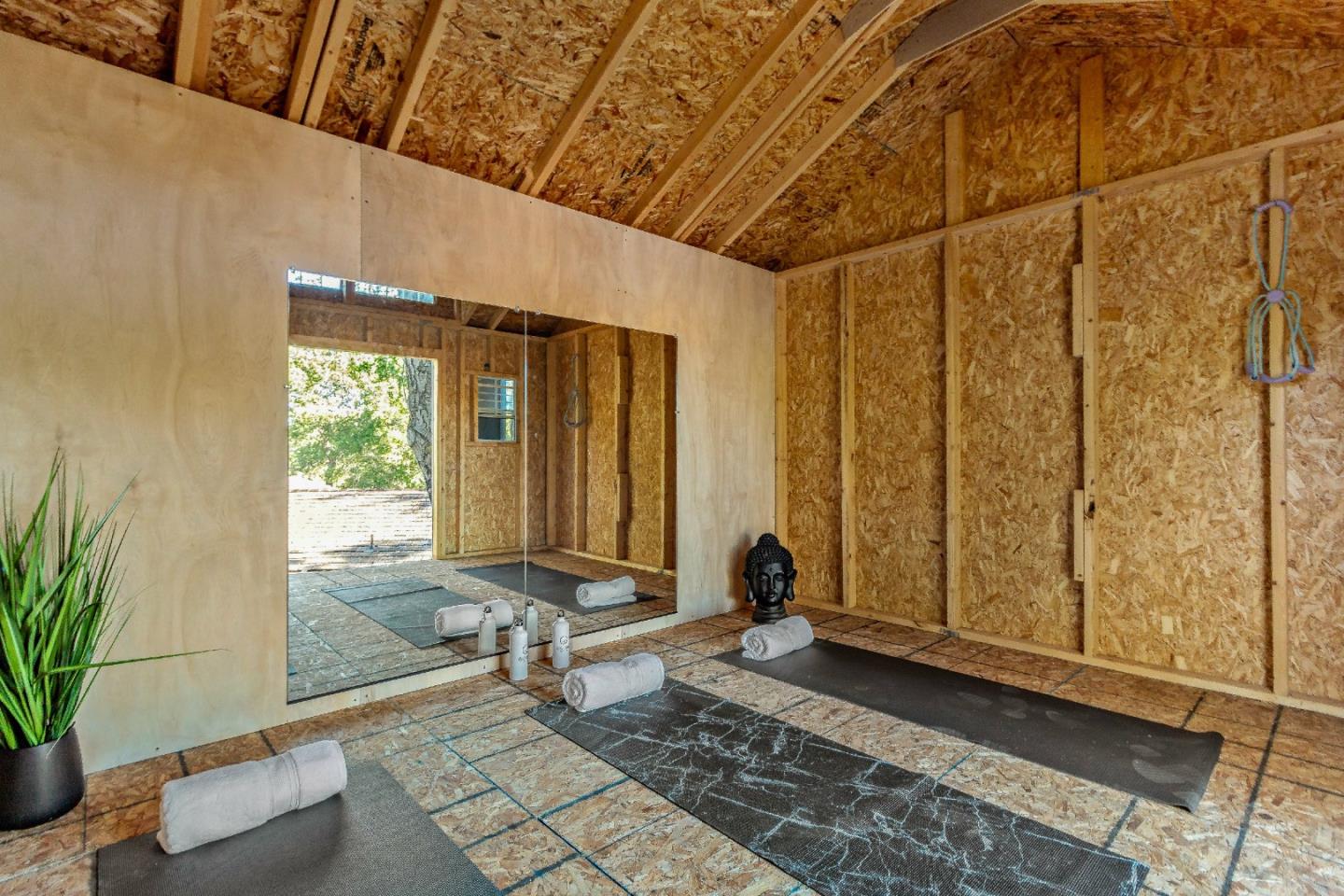 335 Harcross Road Woodside, CA 94062 - Photo 40 of 72 a view of a bathroom with a tub and shower