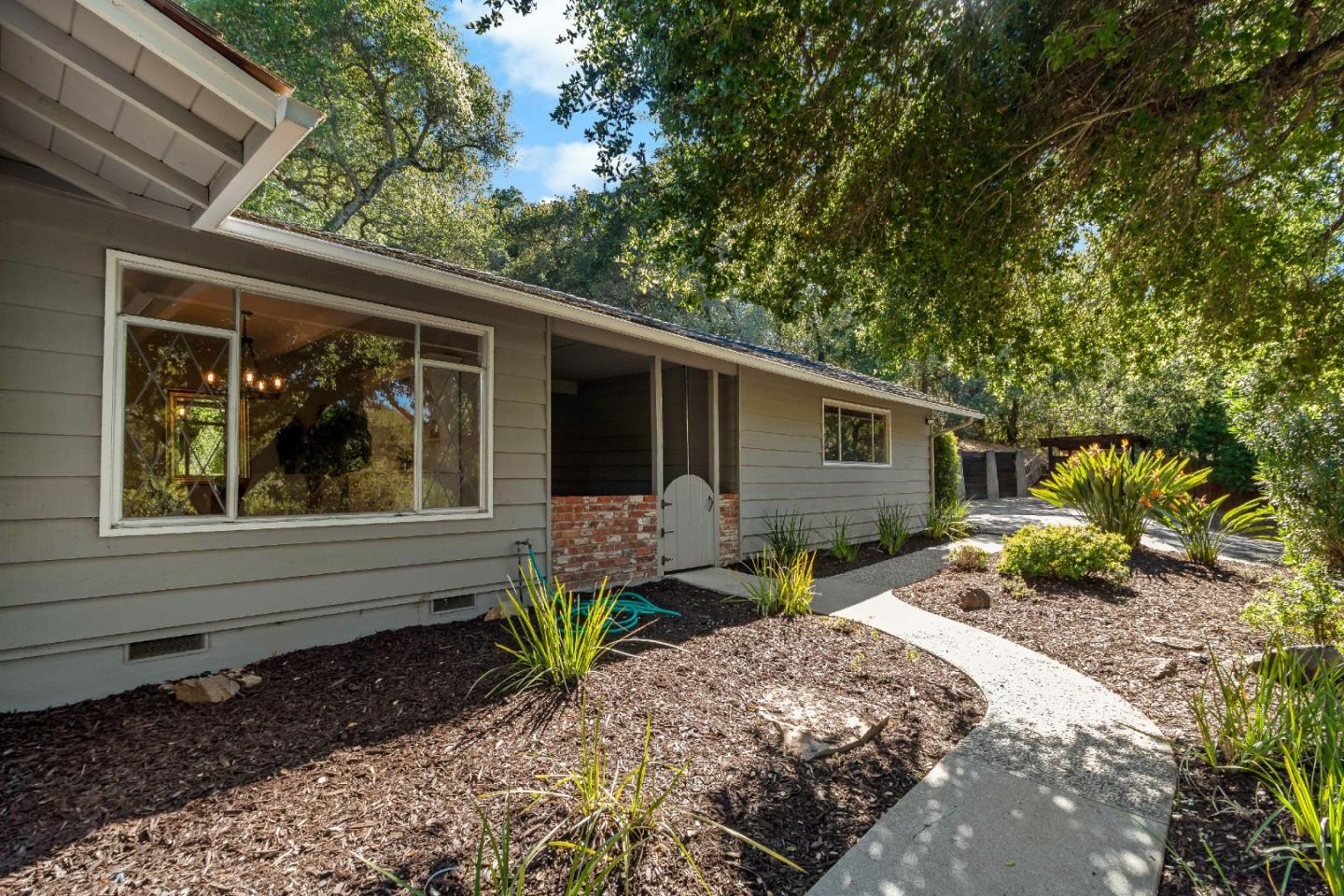 335 Harcross Road Woodside, CA 94062 - Photo 5 of 72 a front view of a house with garden