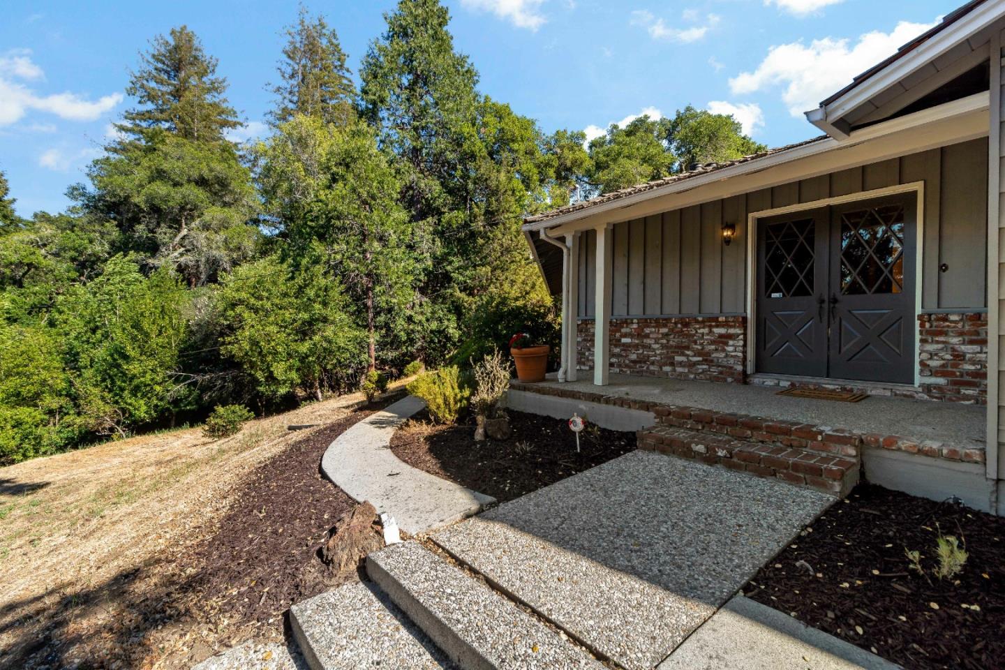335 Harcross Road Woodside, CA 94062 - Photo 7 of 72 a front view of a house with garden