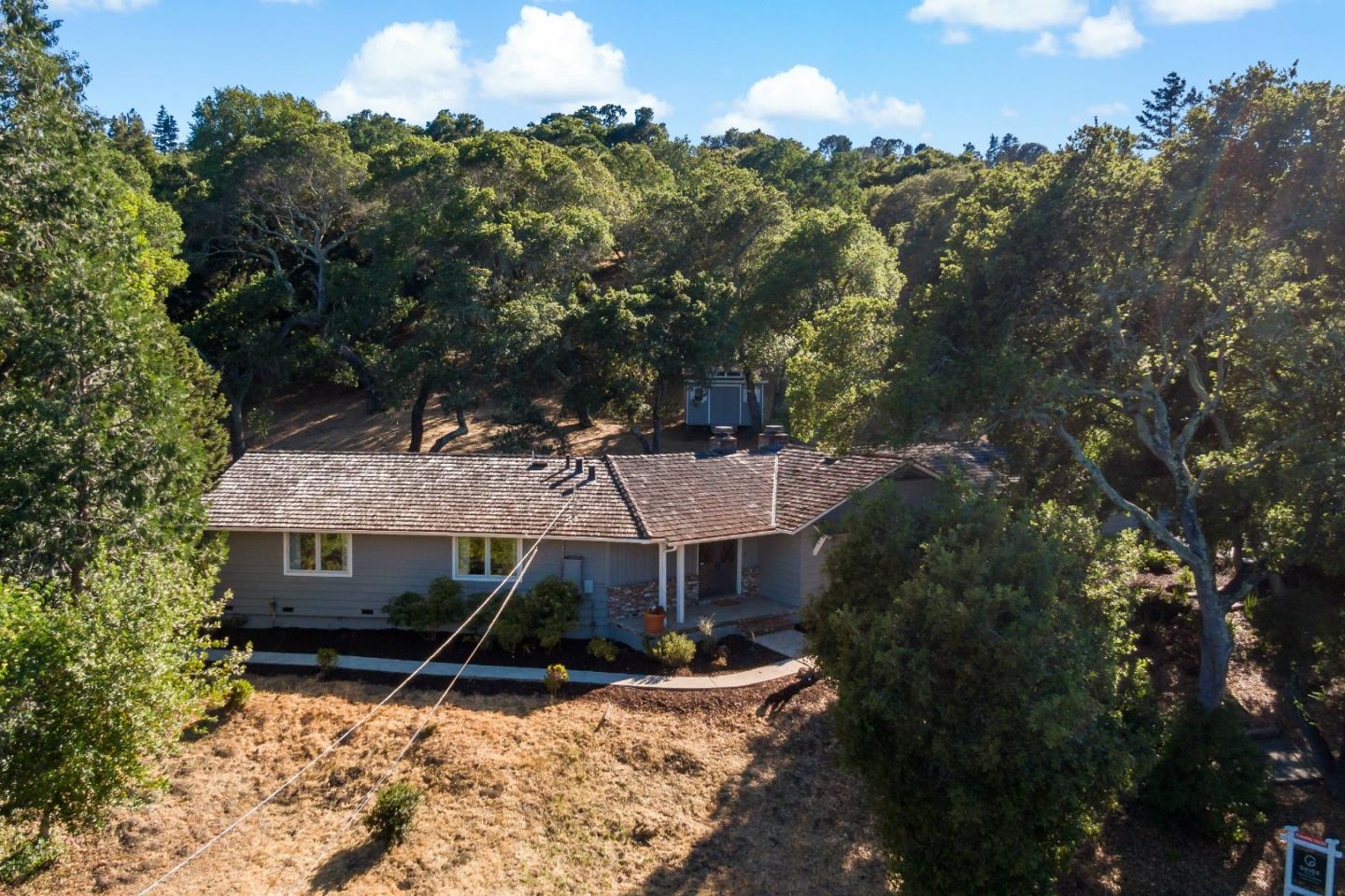 335 Harcross Road Woodside, CA 94062 - Photo 62 of 72 an aerial view of a house with a yard