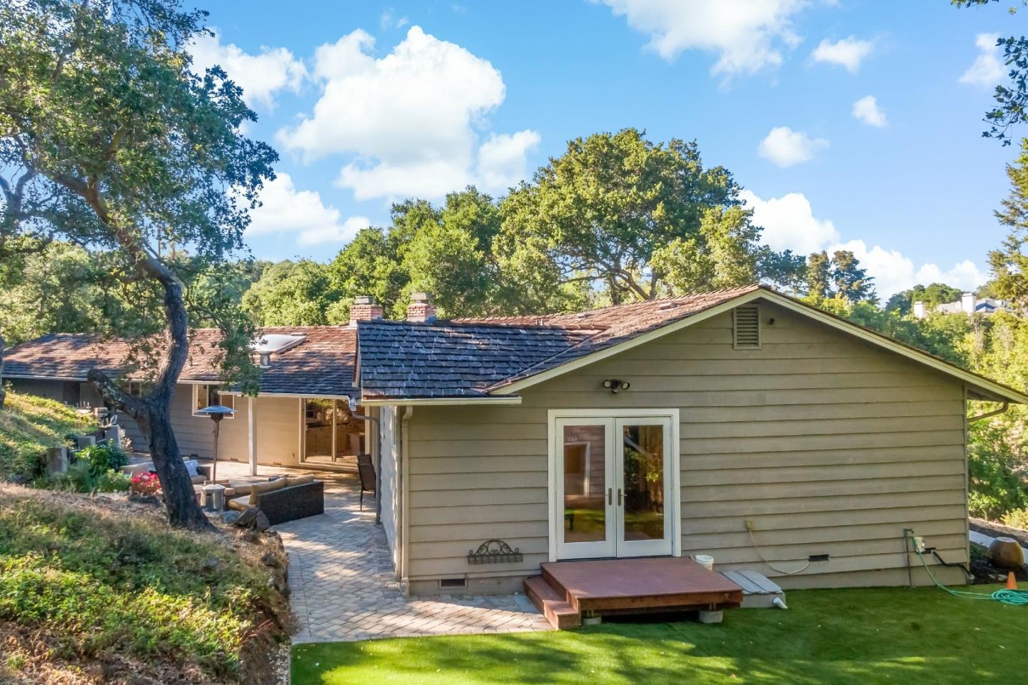 335 Harcross Road Woodside, CA 94062 - Photo 63 of 72 a front view of a house with a yard