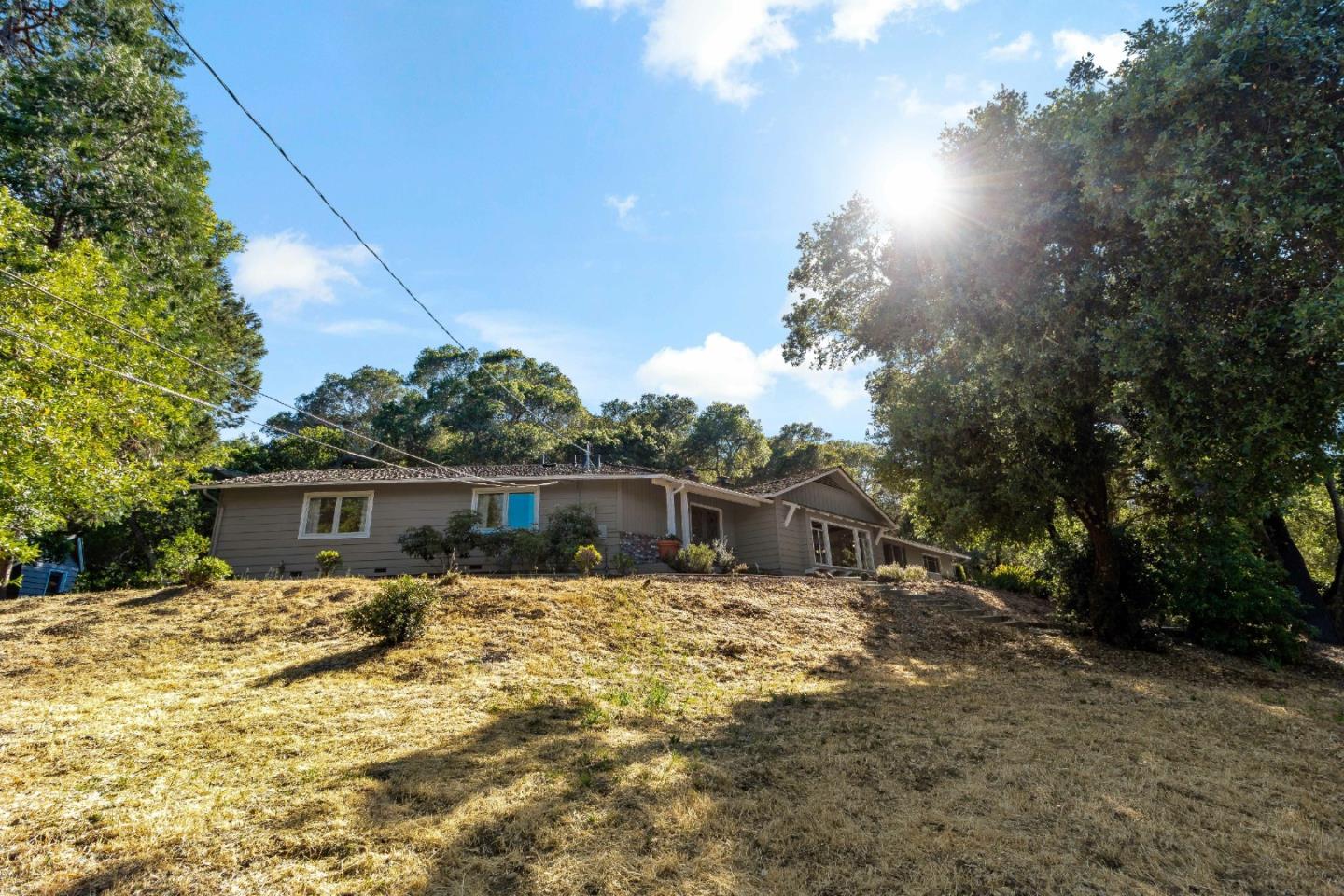335 Harcross Road Woodside, CA 94062 - Photo 8 of 72 a view of a house with a yard