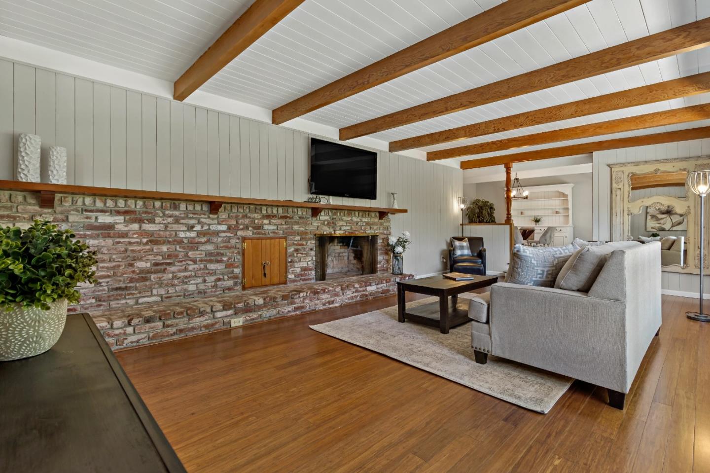 335 Harcross Road Woodside, CA 94062 - Photo 9 of 72 a living room with furniture and a fireplace