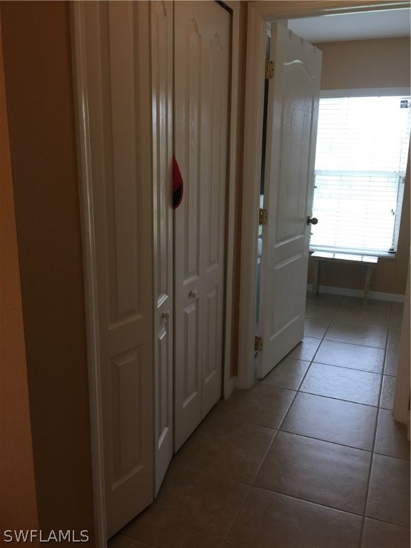 3115 Meadow Road Lehigh Acres, FL 33974 - Photo 16 of 23 a view of an empty room with a window