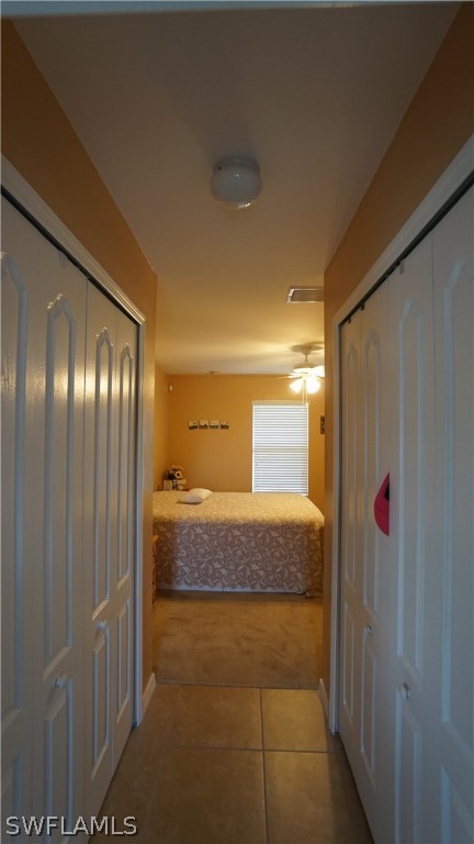 3115 Meadow Road Lehigh Acres, FL 33974 - Photo 18 of 23 a spacious bathroom with a granite countertop sink and a mirror