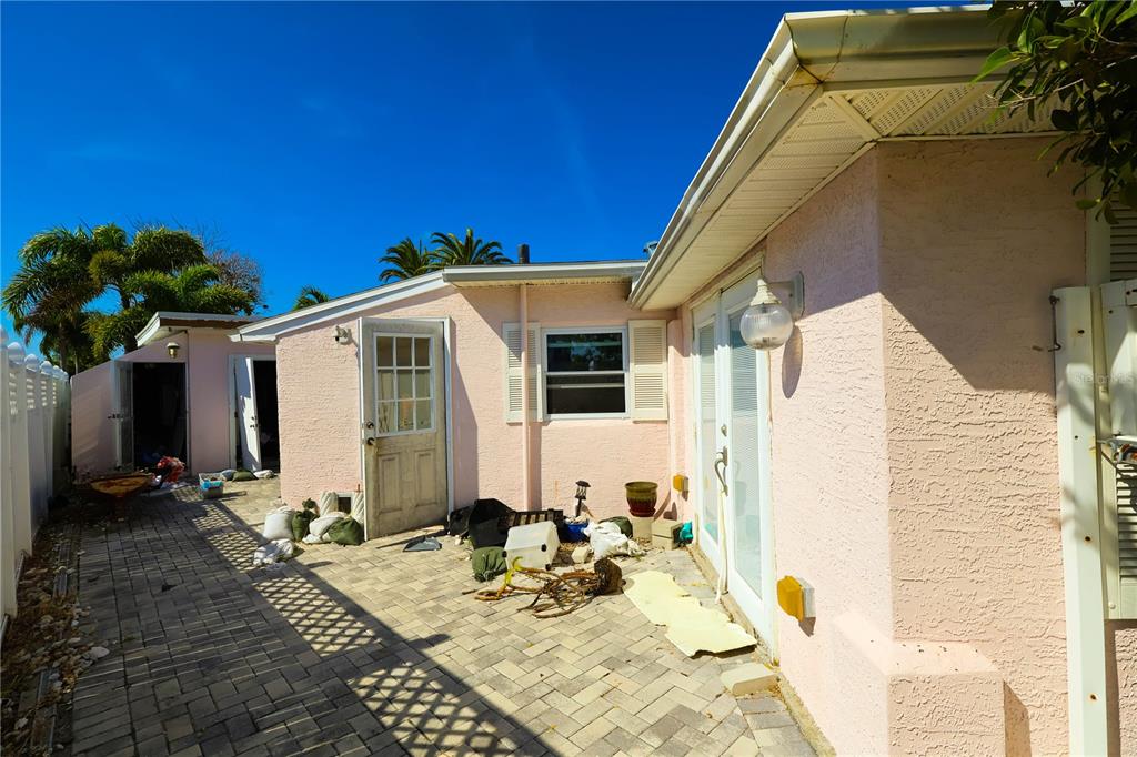 365 145th Avenue Madeira Beach, FL 33708 - Photo 11 of 16 a view of a house with backyard