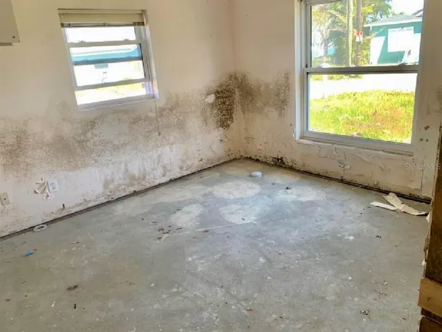 an empty room with a window