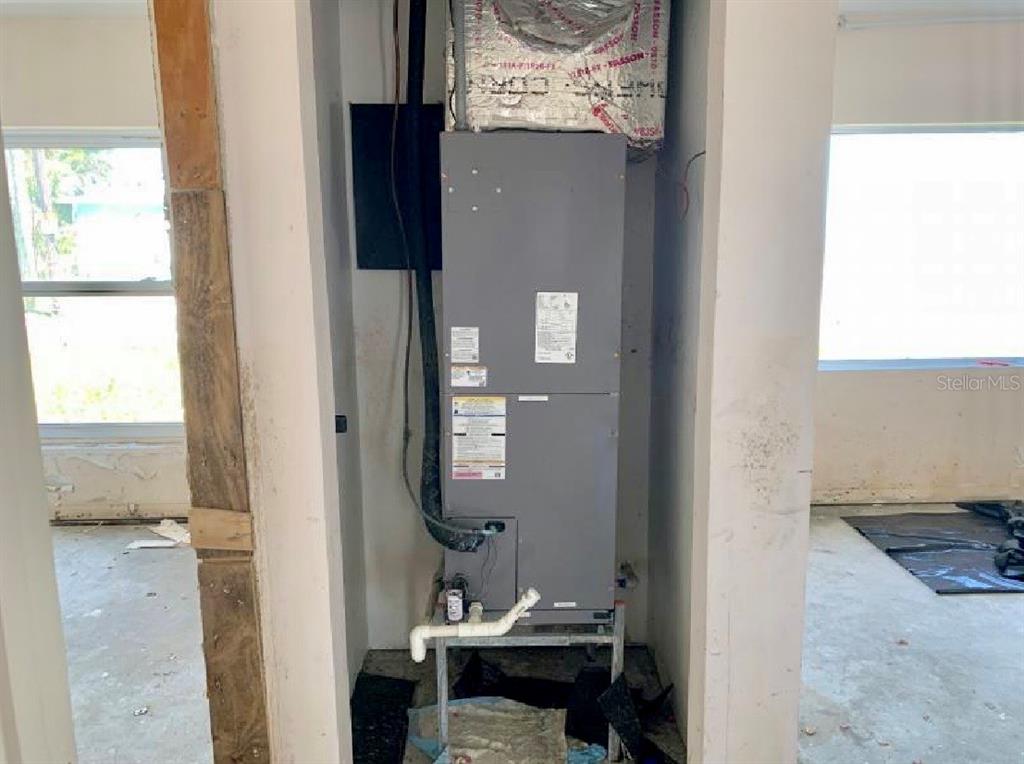 365 145th Avenue Madeira Beach, FL 33708 - Photo 10 of 16 a bathroom with a sink and a mirror