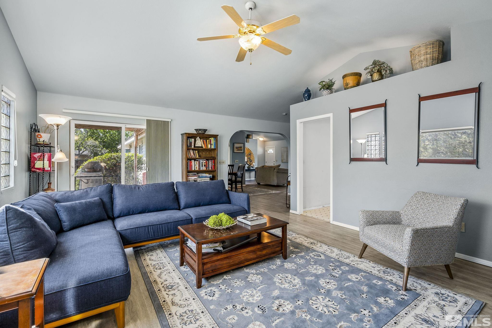 1090 Lavender Way Reno, NV 89521 - Photo 11 of 22 a living room with furniture a rug and a window
