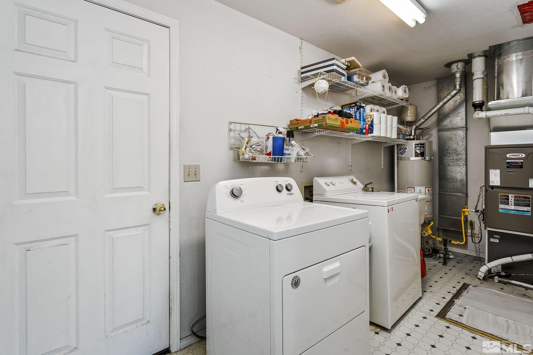 1090 Lavender Way Reno, NV 89521 - Photo 22 of 22 a utility room with dryer and washer
