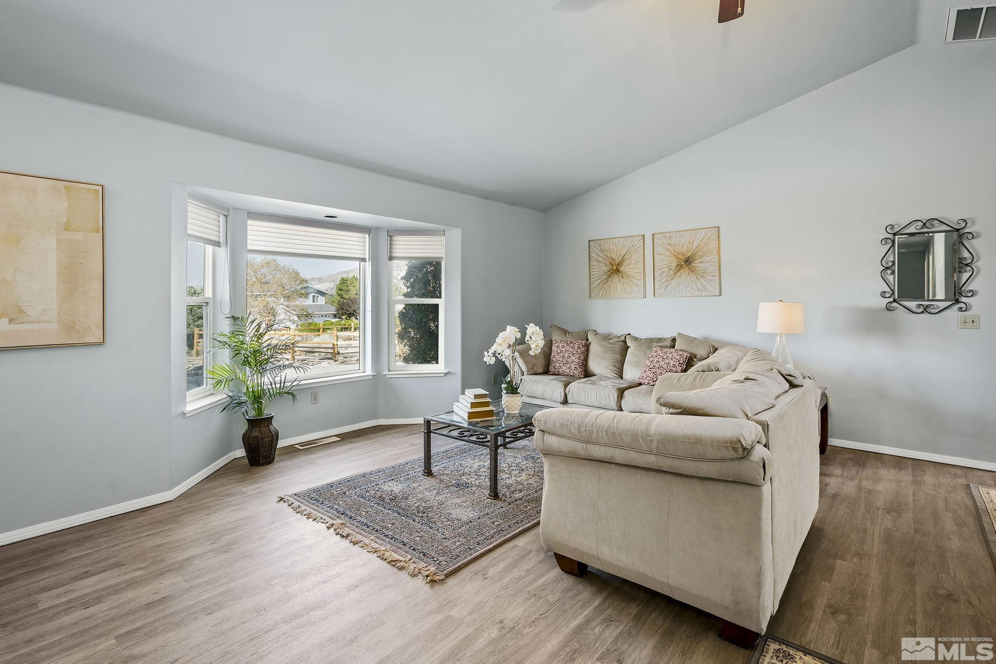 1090 Lavender Way Reno, NV 89521 - Photo 4 of 22 a living room with furniture and a window