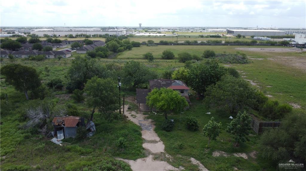 1524 West Hi Line Road Pharr, TX 78577 - Photo 15 of 34 an aerial view of a house with a yard