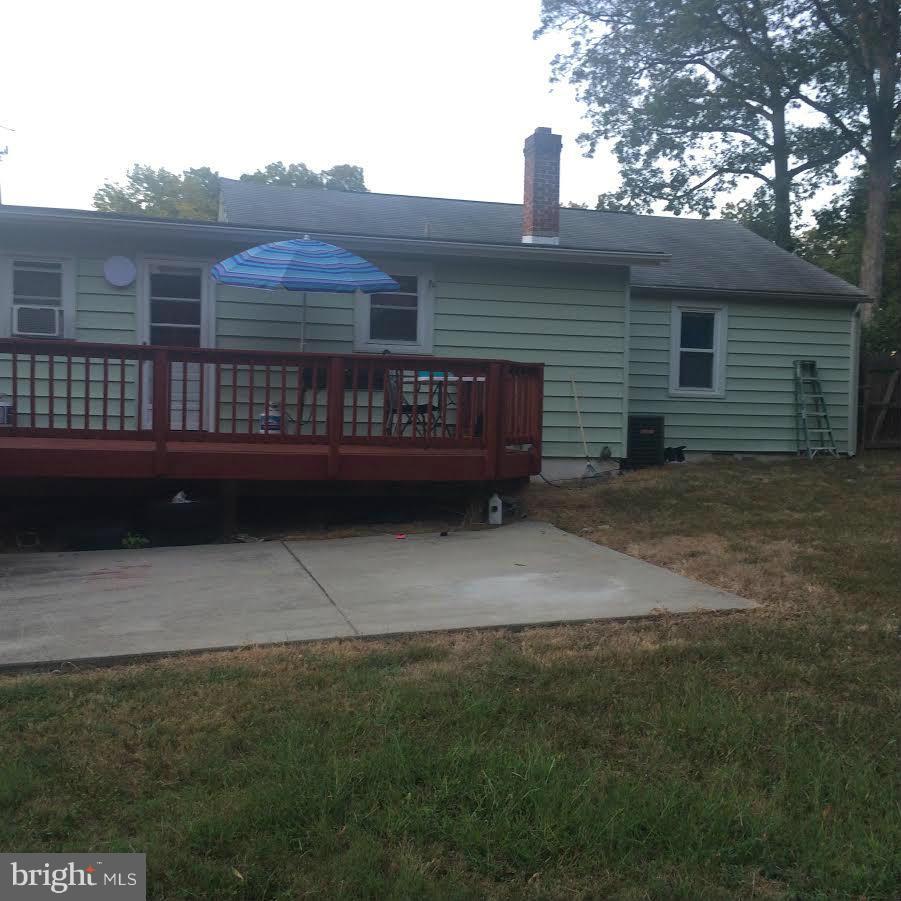 6505 Woodley Road Clinton, MD 20735 - Photo 6 of 12 a view of a house with a yard