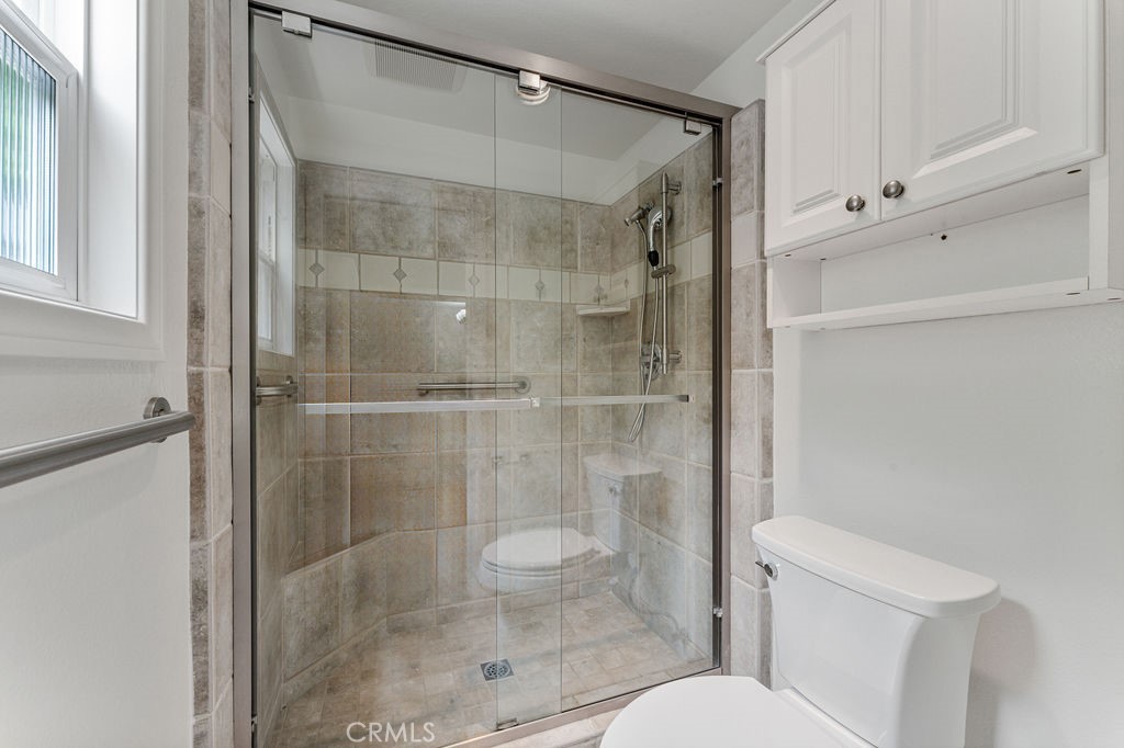 25352 Hugo Road Laguna Niguel, CA 92677 - Photo 12 of 31 Master Bath walk in shower with safety bars