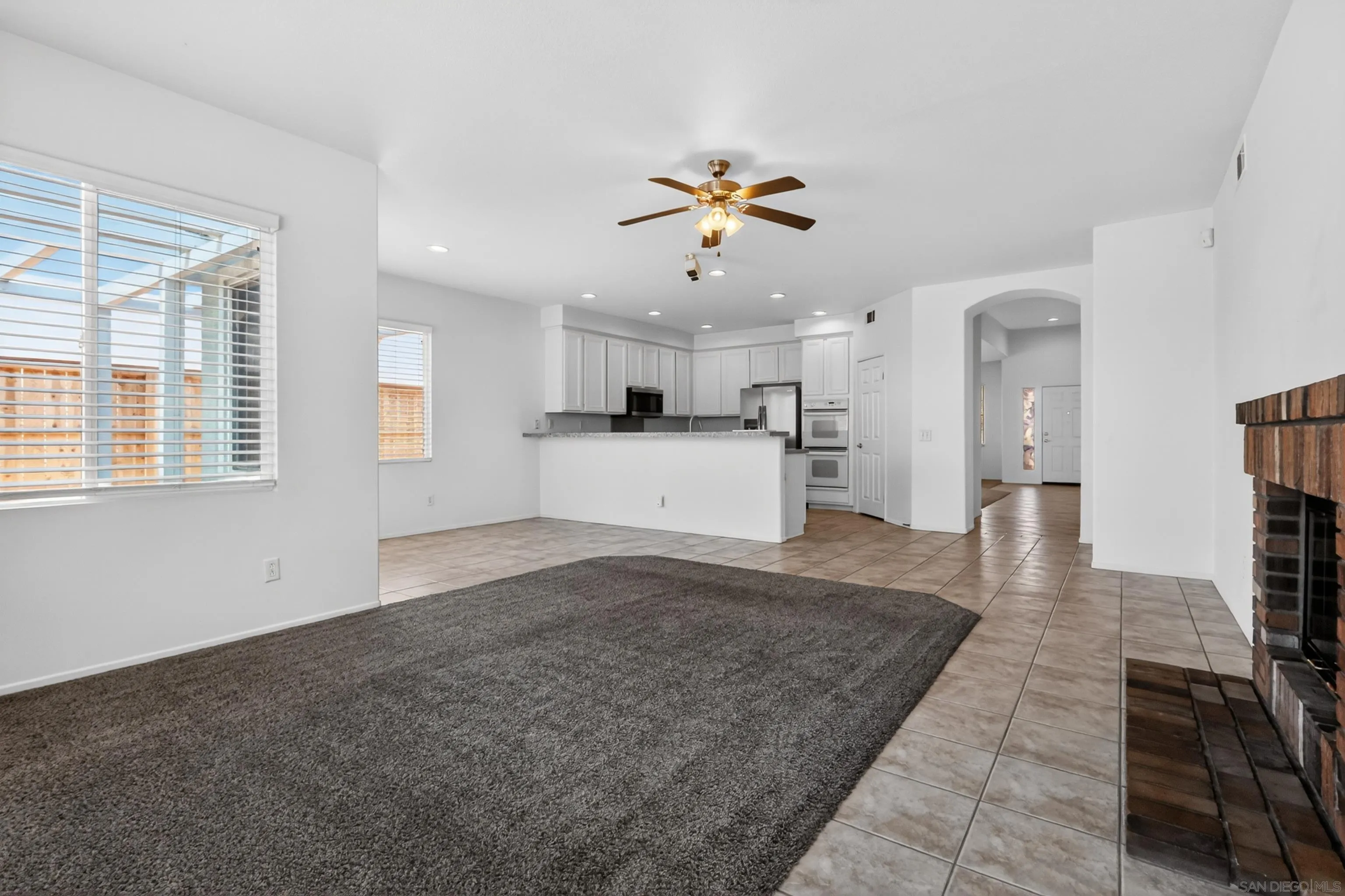 1432 Belmont Park Road Oceanside, CA 92057 - Photo 24 of 54 a view of a kitchen with a sink and a window