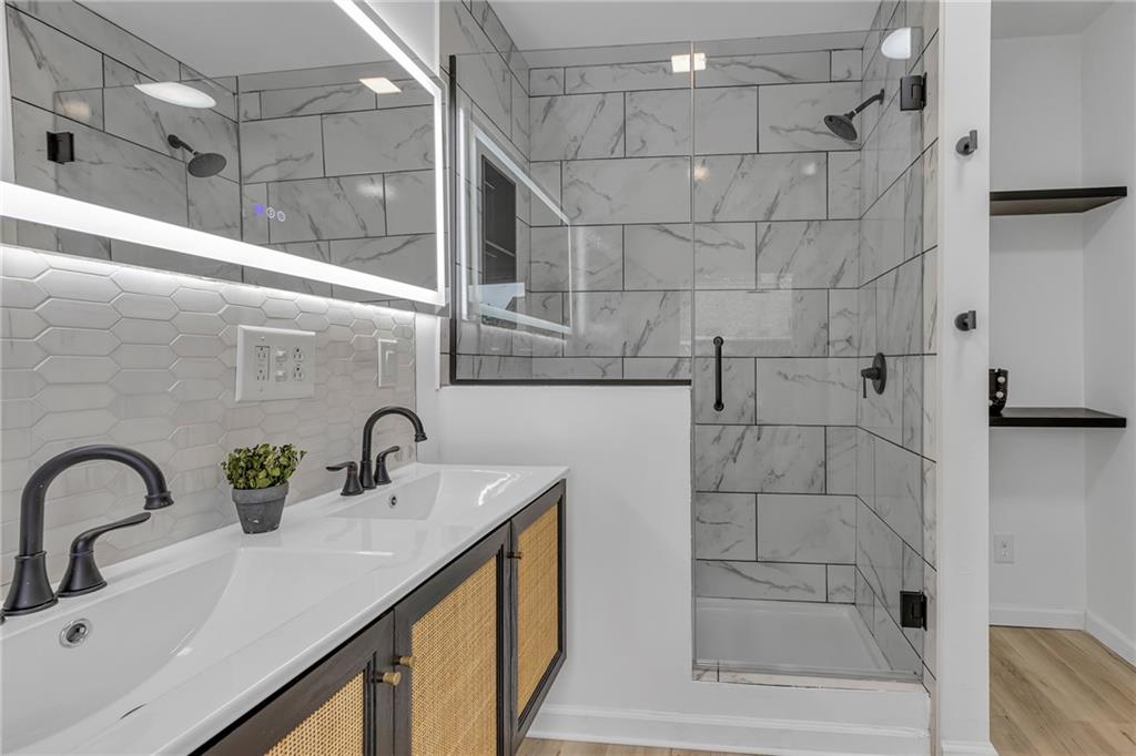 193 Virginia Avenue Rochester, PA 15074 - Photo 23 of 37 a bathroom with a sink and a shower