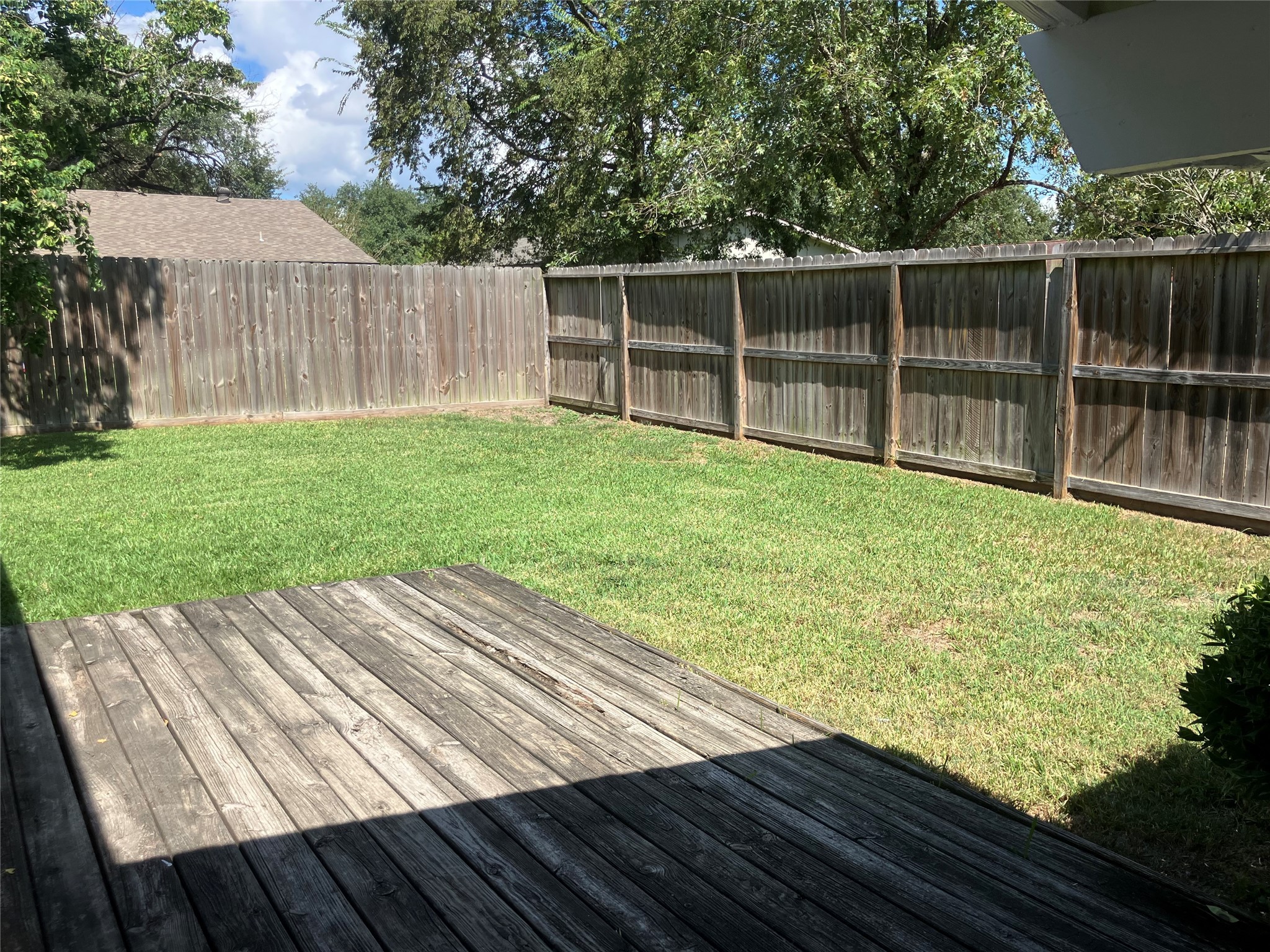 4030 Lost Oak Drive Spring, TX 77388 - Photo 17 of 17 a view of a backyard with wooden floor and fence