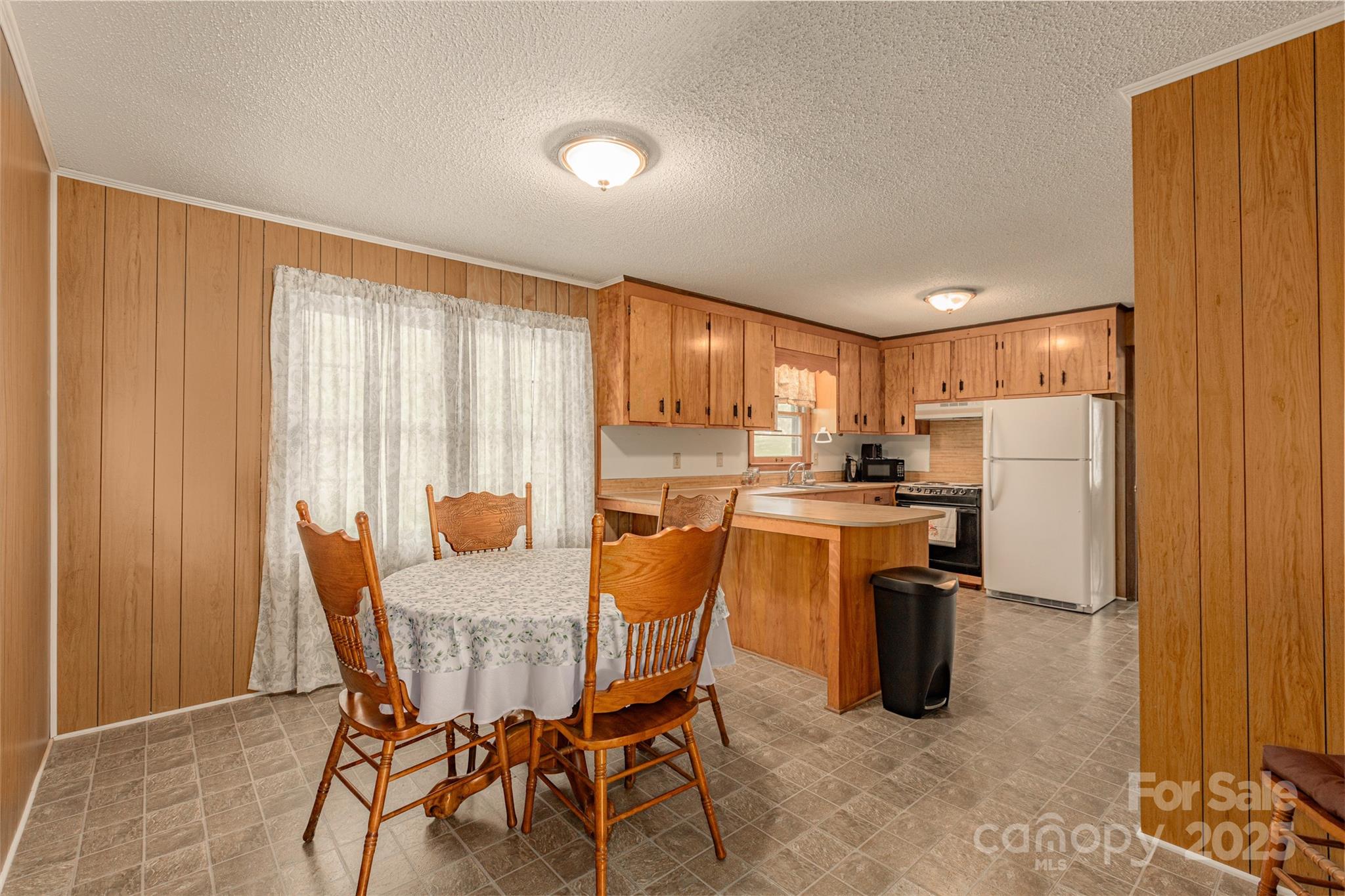 72 Cooper Drive Nebo, NC 28761 - Photo 11 of 18 a dining room with furniture and window