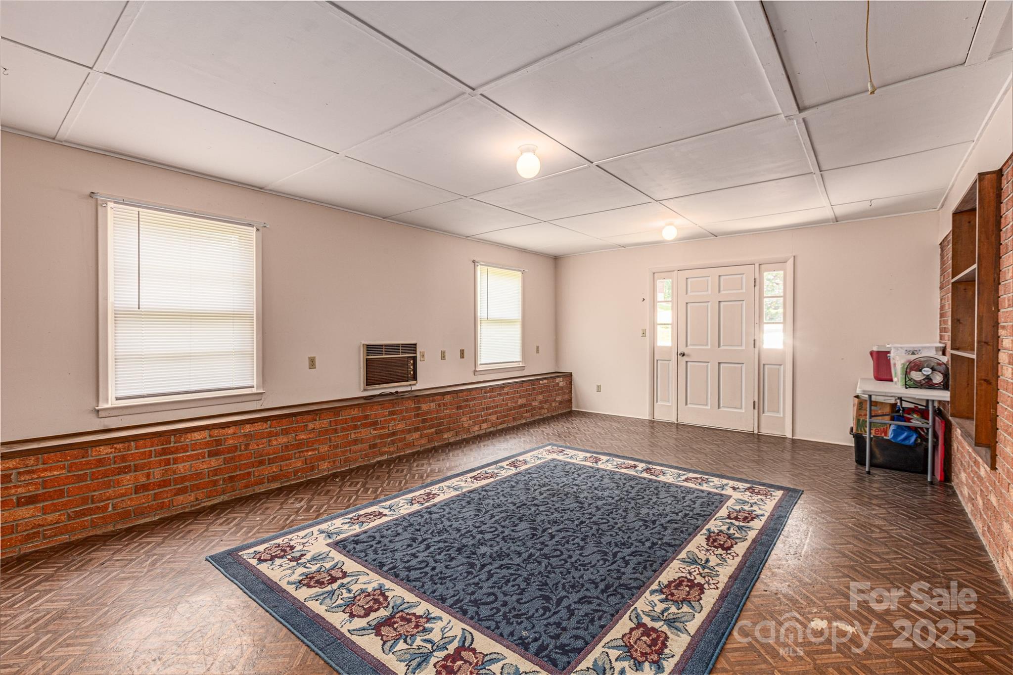 72 Cooper Drive Nebo, NC 28761 - Photo 17 of 18 a living room with furniture and a rug