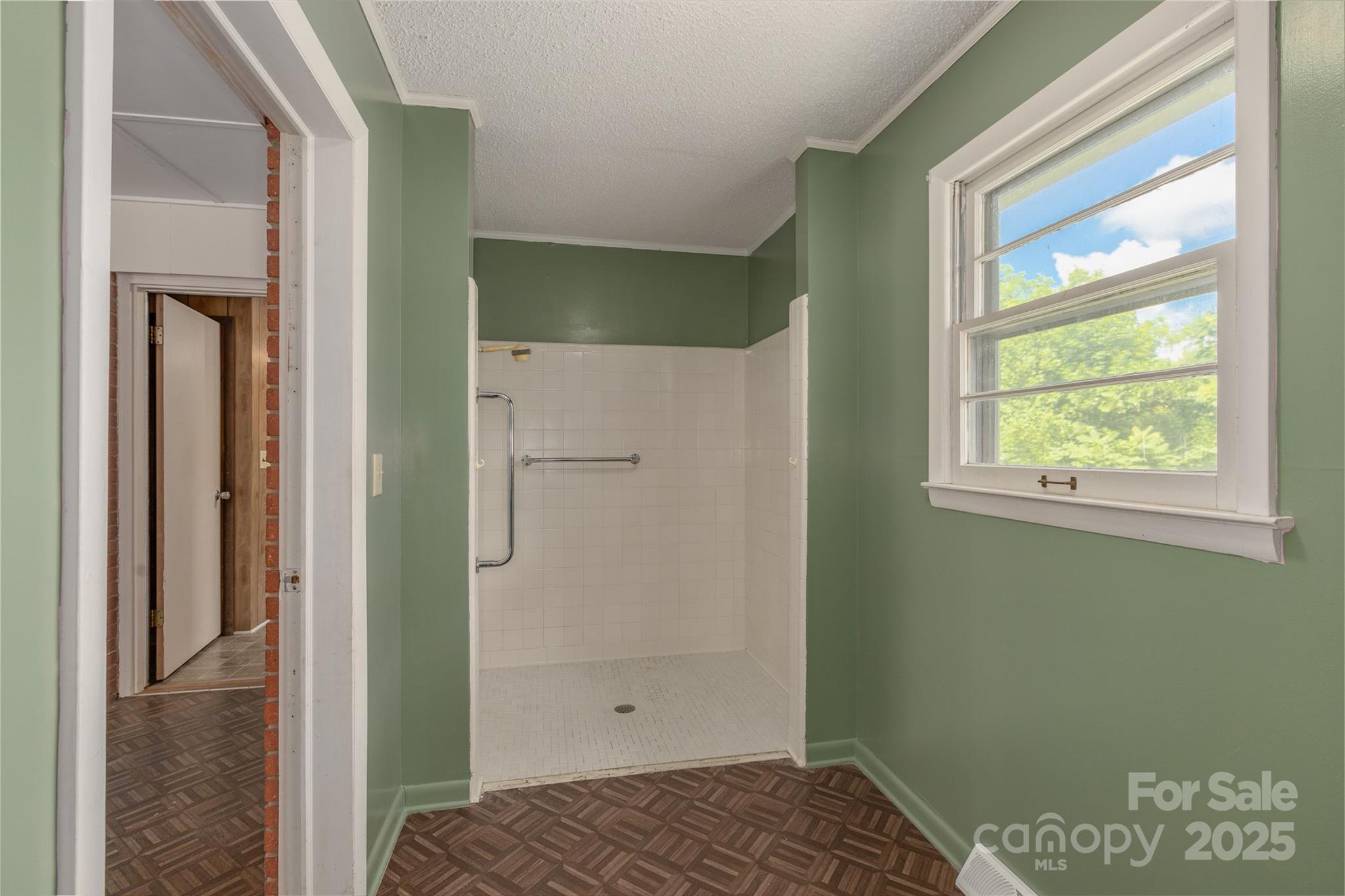 72 Cooper Drive Nebo, NC 28761 - Photo 18 of 18 a bathroom with a bathtub