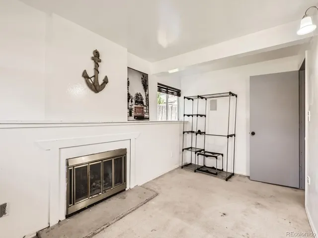 a view of a livingroom with a fireplace