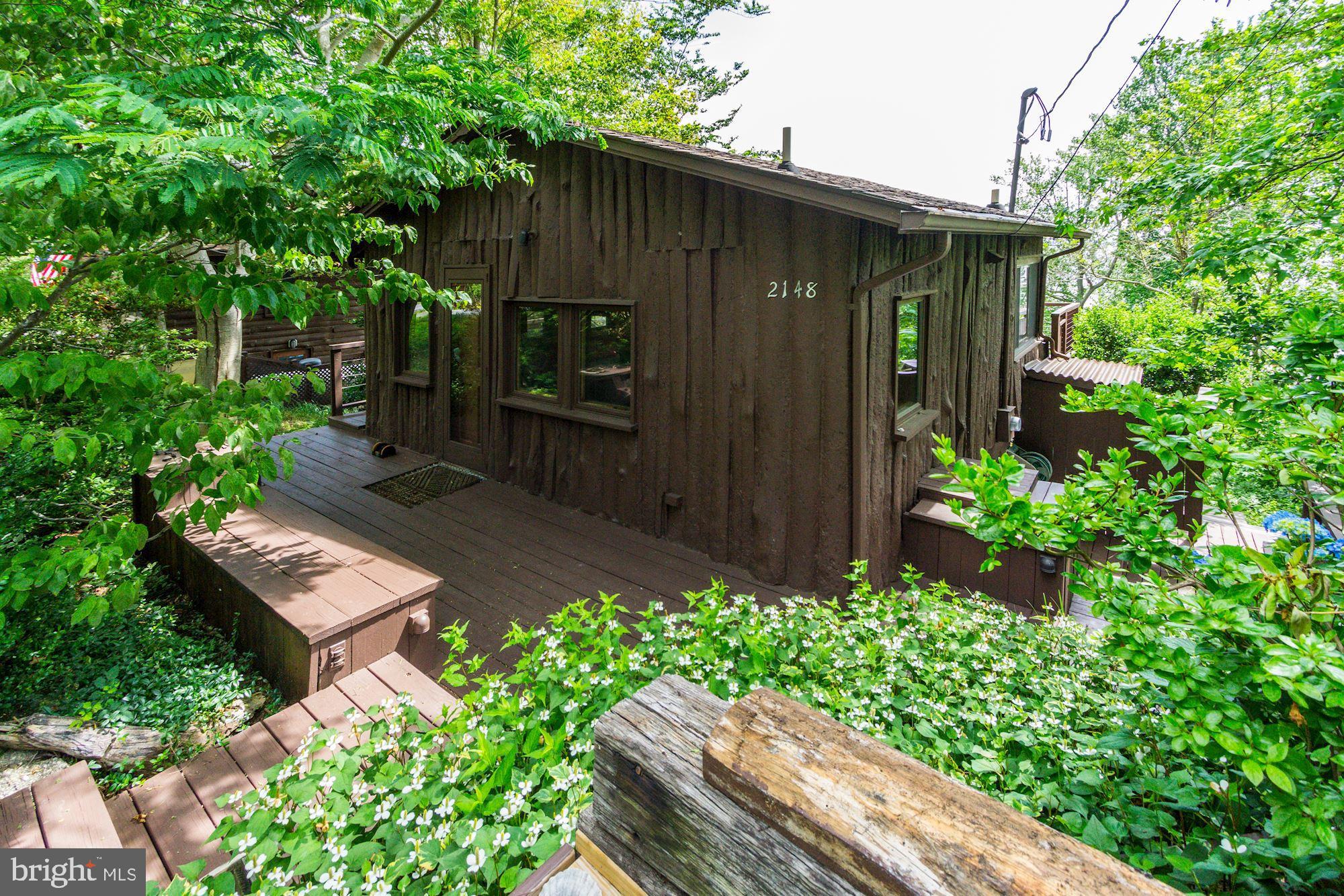 2148 Cedar Road Port Republic, MD 20676 - Photo 2 of 55 a backyard of a house with lots of green space