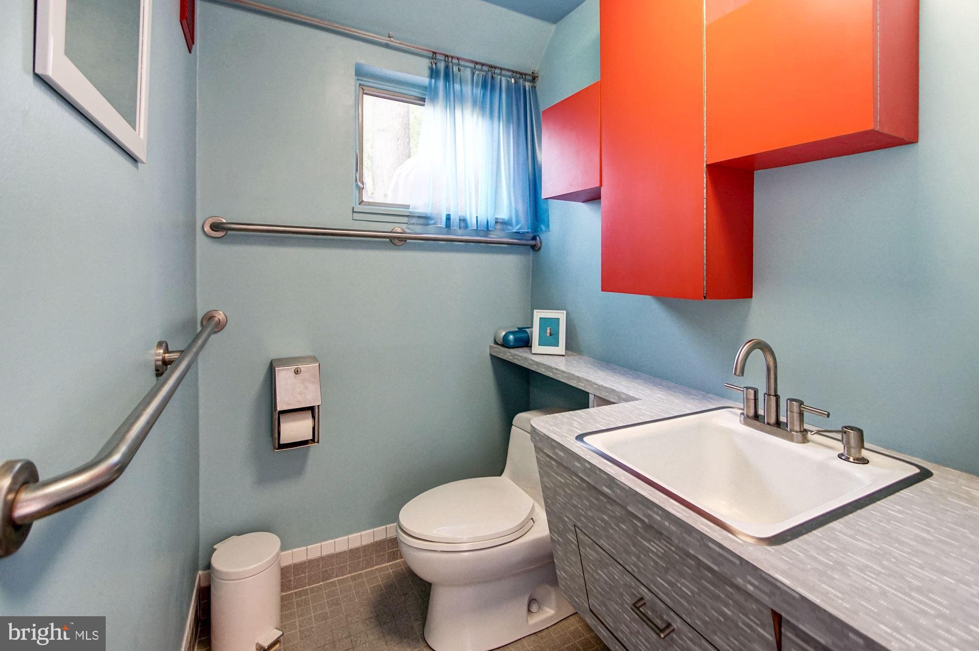 2148 Cedar Road Port Republic, MD 20676 - Photo 30 of 55 a bathroom with a sink a toilet and mirror