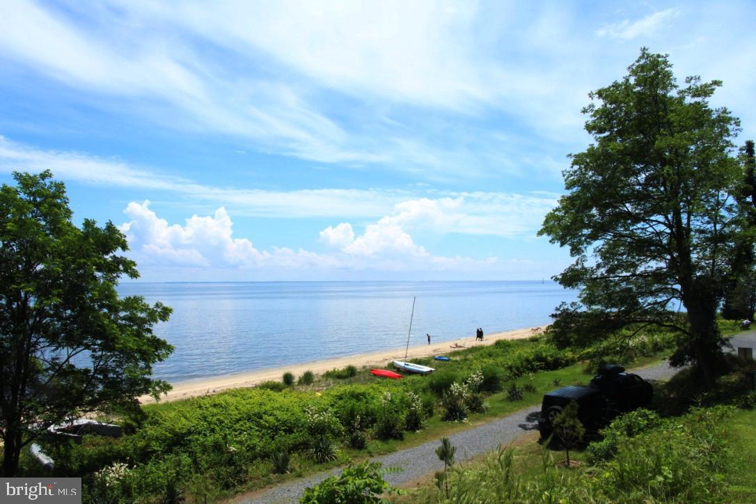2148 Cedar Road Port Republic, MD 20676 - Photo 52 of 55 a view of a lake with a yard