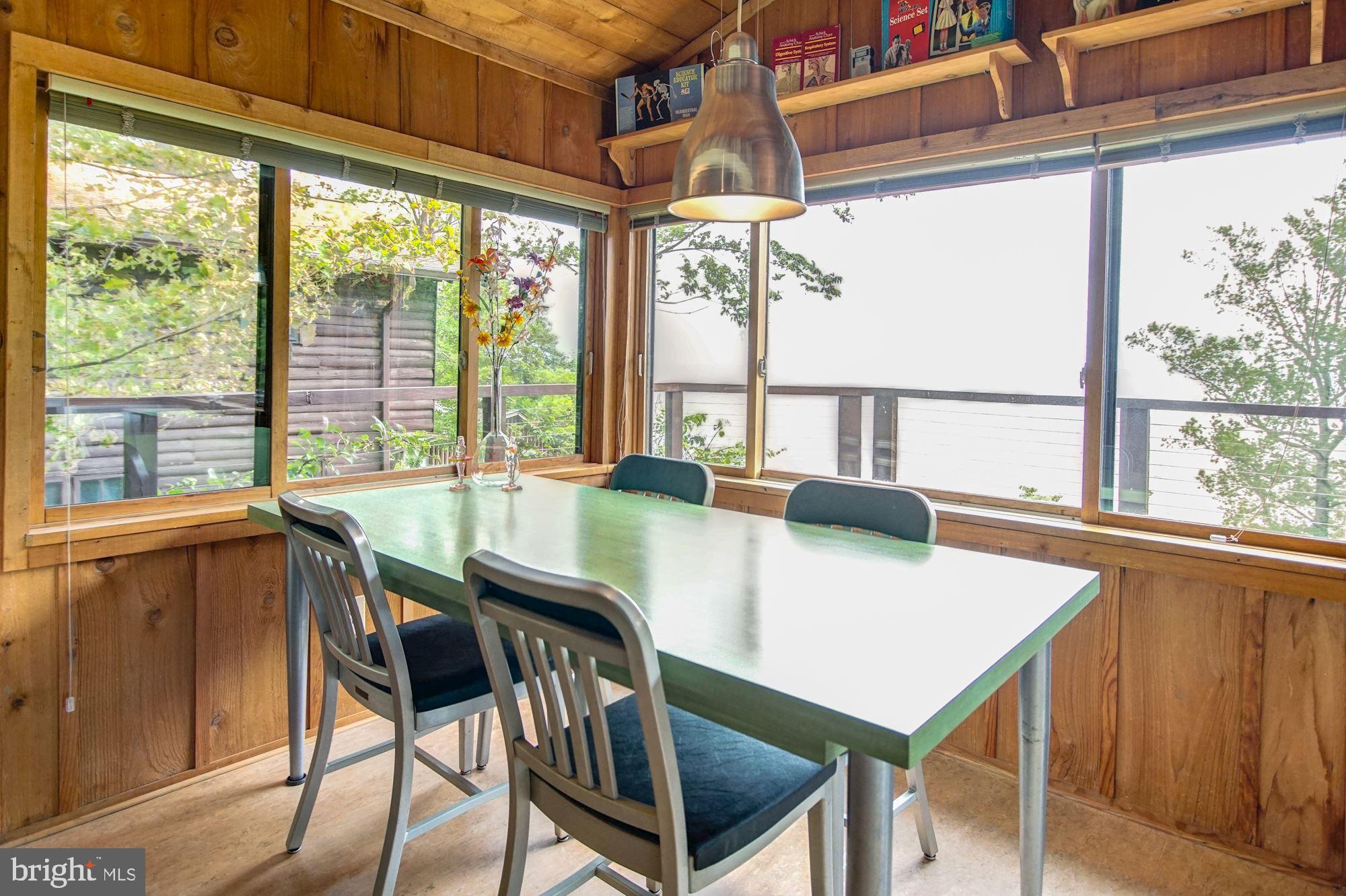 2148 Cedar Road Port Republic, MD 20676 - Photo 8 of 55 a view of a dining room with furniture window and outside view