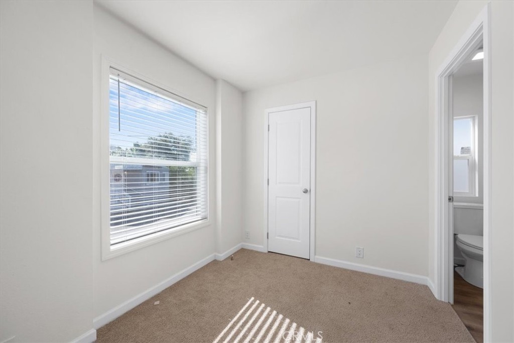 1255 Orcutt Road, Unit B27 San Luis Obispo, CA 93401 - Photo 13 of 24 a view of an empty room with a window