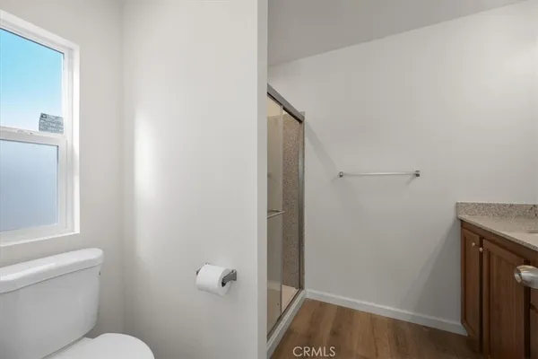 a bathroom with a sink and toilet