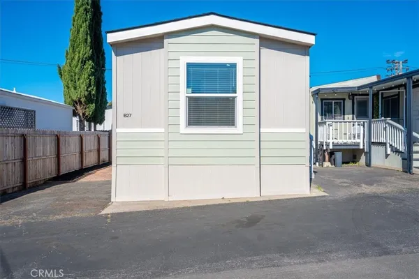 a front view of a house with a garage