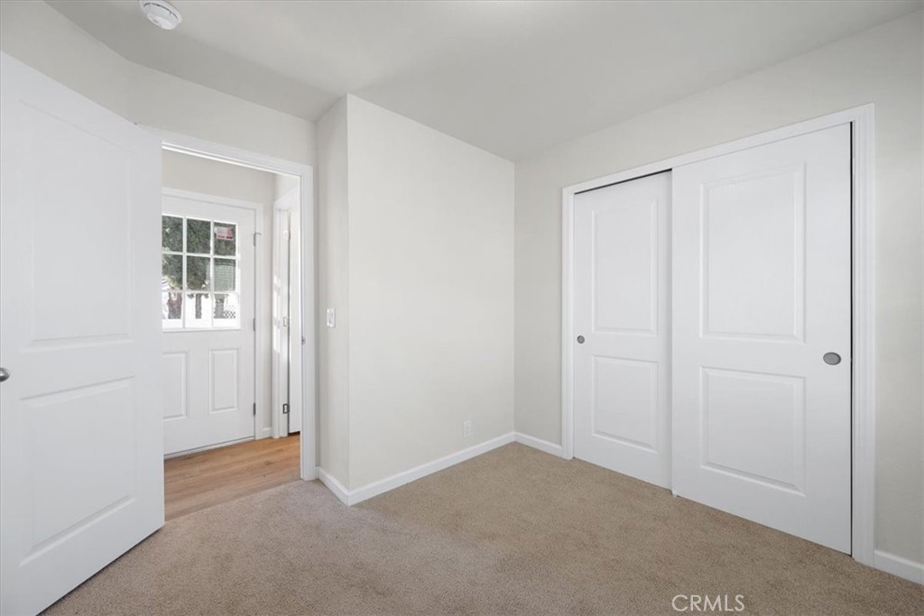 1255 Orcutt Road, Unit B27 San Luis Obispo, CA 93401 - Photo 21 of 24 a view of an empty room with closet and a window