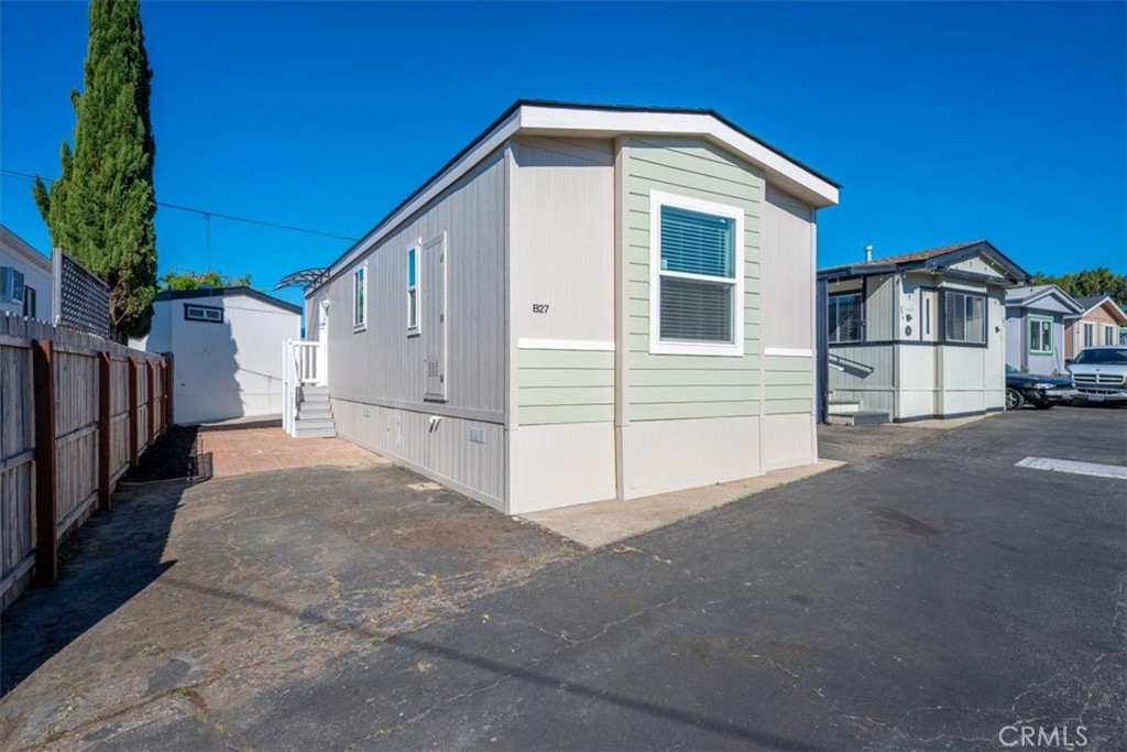 1255 Orcutt Road, Unit B27 San Luis Obispo, CA 93401 - Photo 5 of 24 a view of a house with a yard