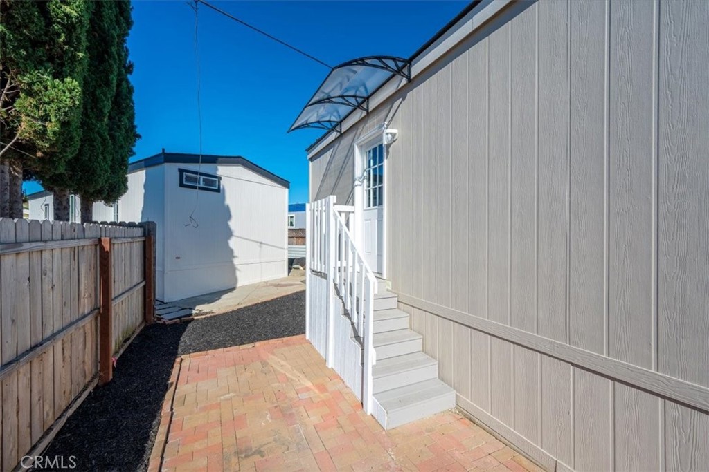 1255 Orcutt Road, Unit B27 San Luis Obispo, CA 93401 - Photo 7 of 24 a view of a house with wooden fence