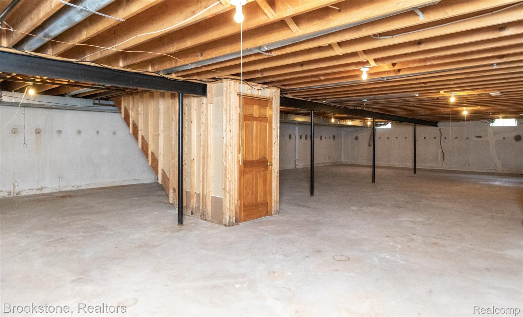 679 West Hamlin Road Rochester, MI 48307 - Photo 33 of 35 Sprawling Lower Level has Tall Ceilings