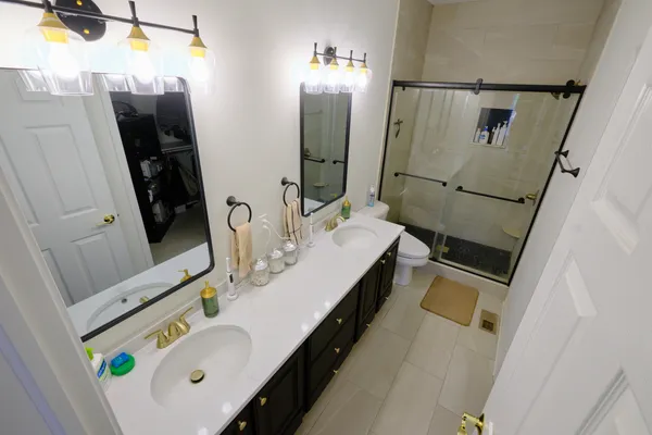 a bathroom with sink and mirror
