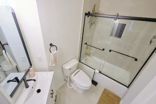 a bathroom with a sink and a shower