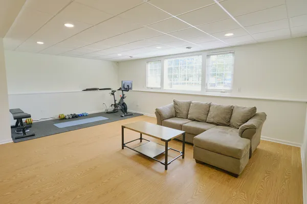 a living room with furniture and a window