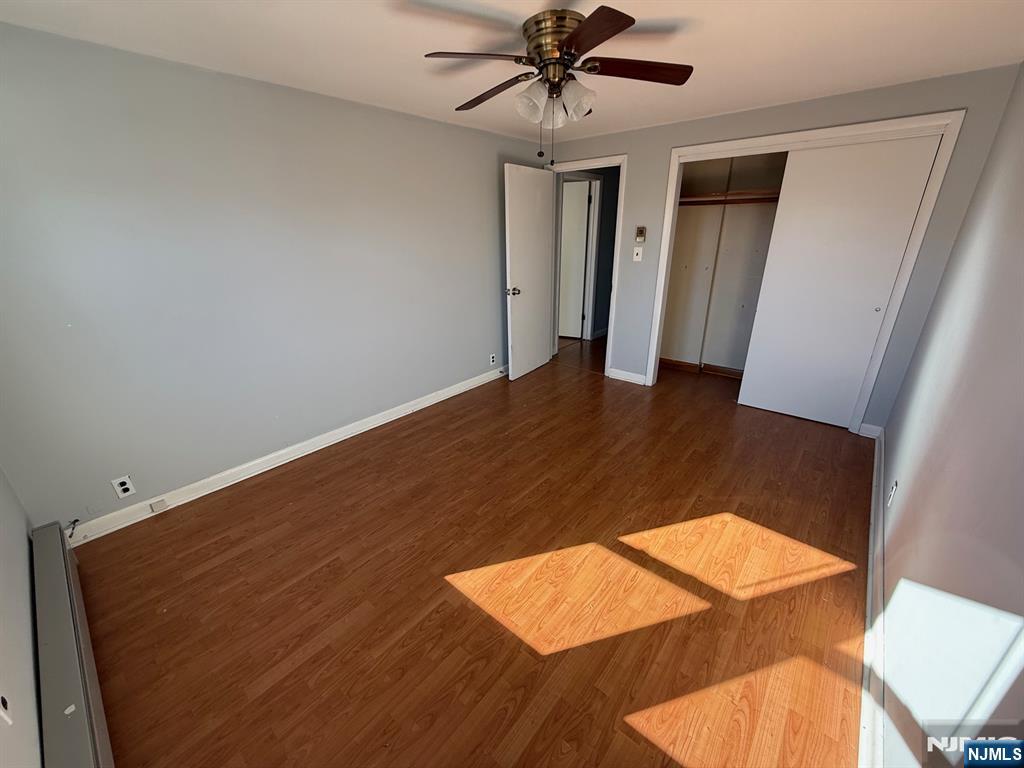 618 8th Street, Unit 2 Lyndhurst, NJ 07071 - Photo 8 of 10 wooden floor in a hall with an entryway