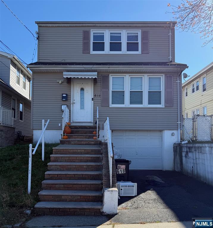 618 8th Street, Unit 2 Lyndhurst, NJ 07071 - Photo 10 of 10 a front view of a house with wooden stairs