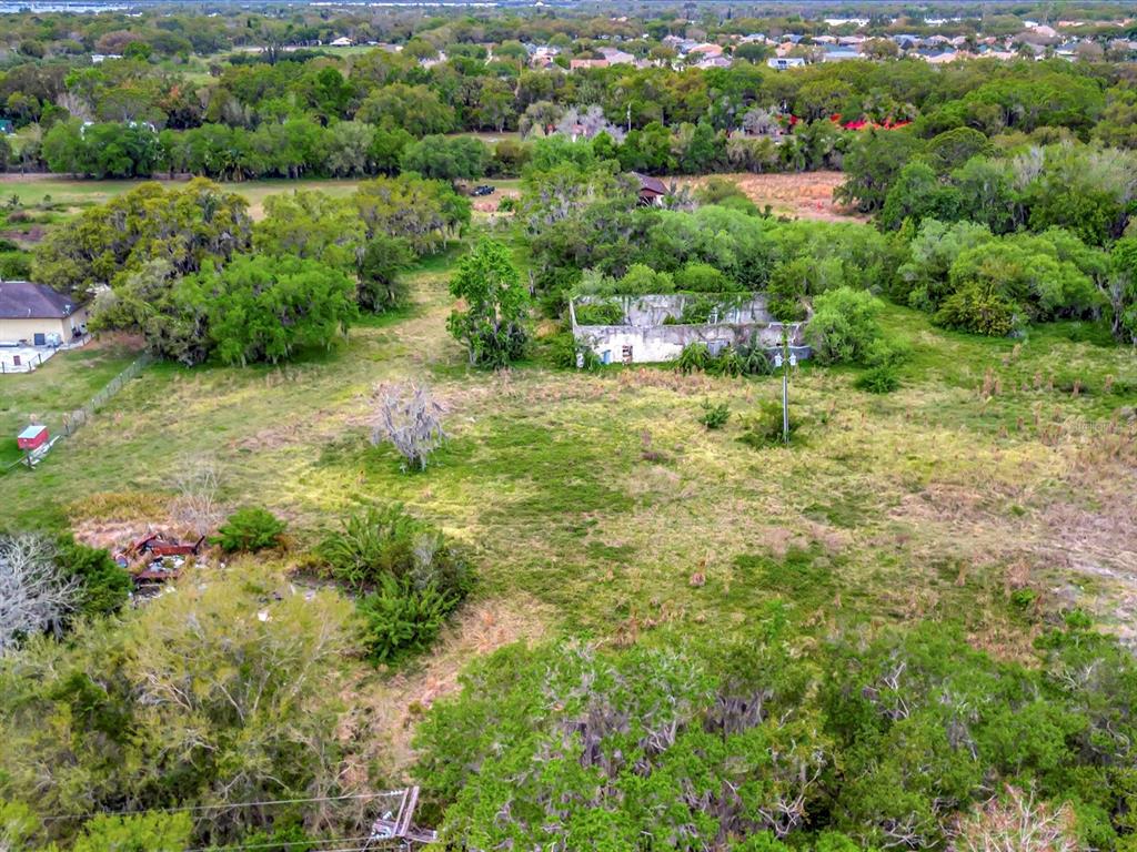 9120 25th Street East Parrish, FL 34219 - Photo 13 of 28 a view of a garden with a lake